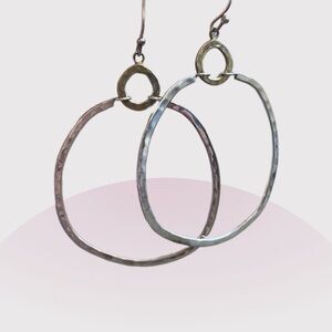 Silpada Sterling Silver and Gold Hoop Earrings
Dynamic duo